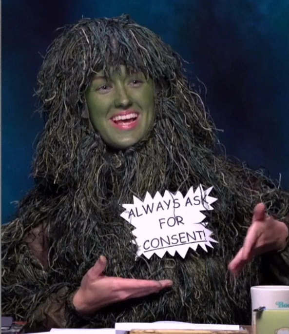 Photo of Ashley Johnson dressed as Henry Crabgrass, a CR character that teaches consent basics
